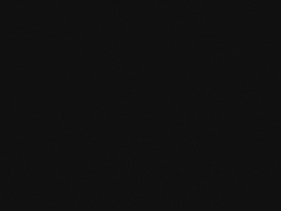 paper airplanes flying on a black background